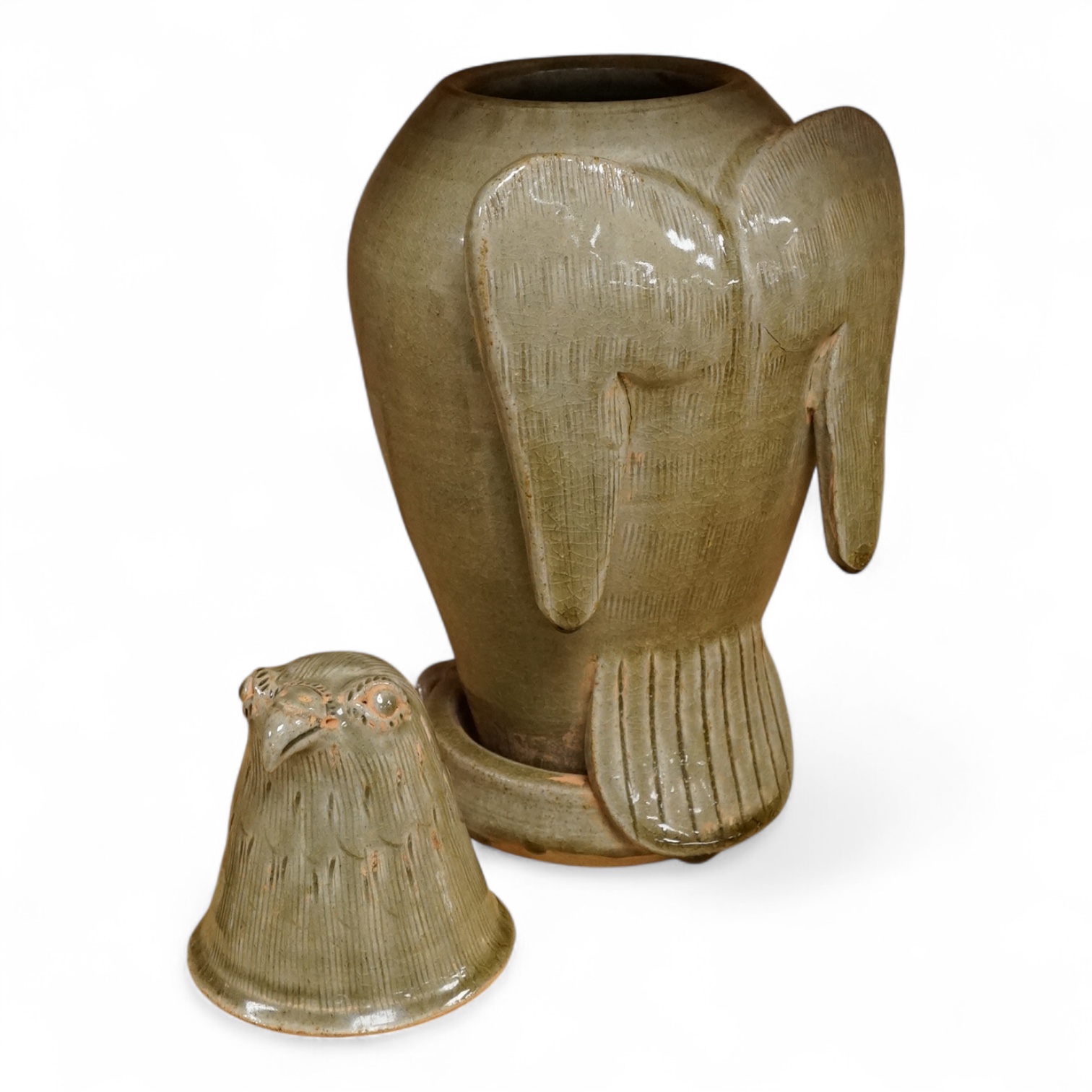 A Korean green glazed bird jar, 33cm high